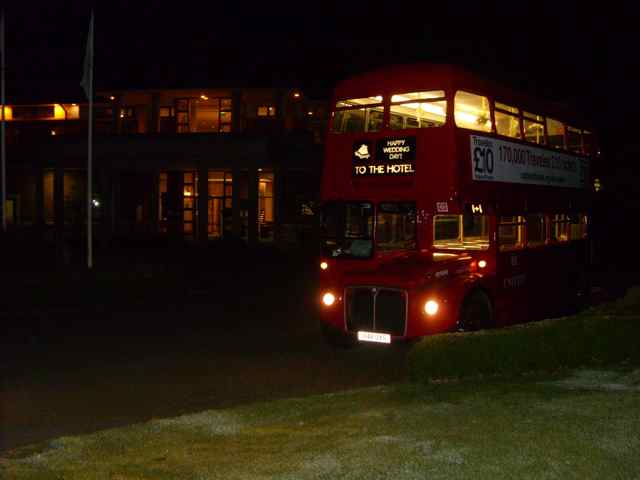 The Routemaster by a golf course.